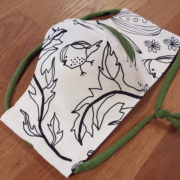 Fabric facemask with birds and plants