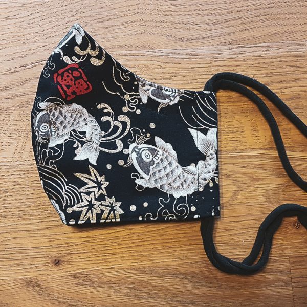 Fabric facemask with Koi karp print on black background